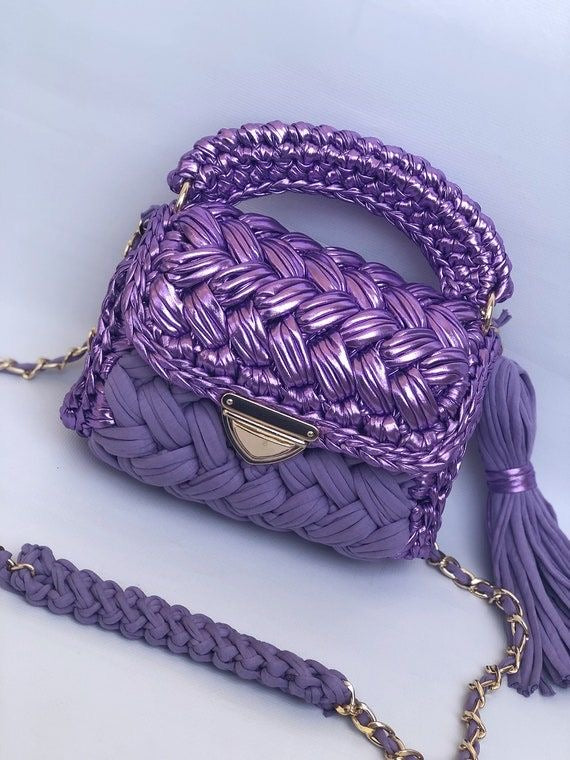 The lavender metallic bag